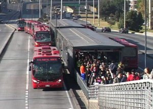 Bogota's efficient BRT with wide 3-lane roads and passenger overbridges