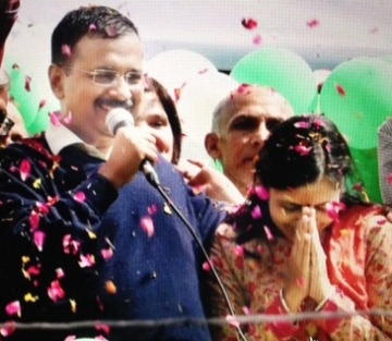 Kejriwal celebrates - PTI photo